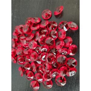 Red plastic gems